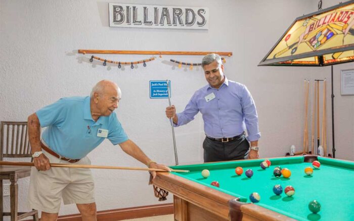 men playing pool