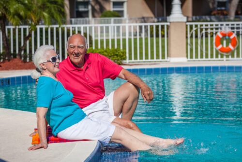 couple by pool