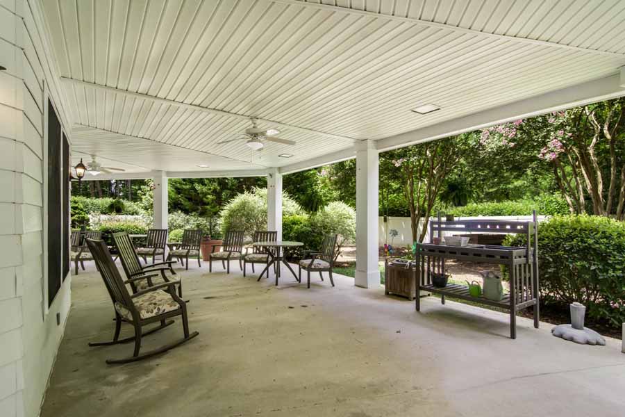 HeartFields at Cary covered porch with rocking chairs
