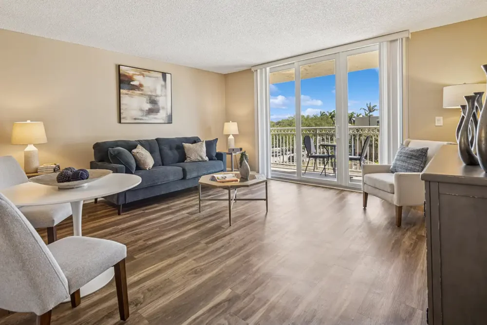 Model One Bedroom Apartment Living Room and Balcony – Assisted Living